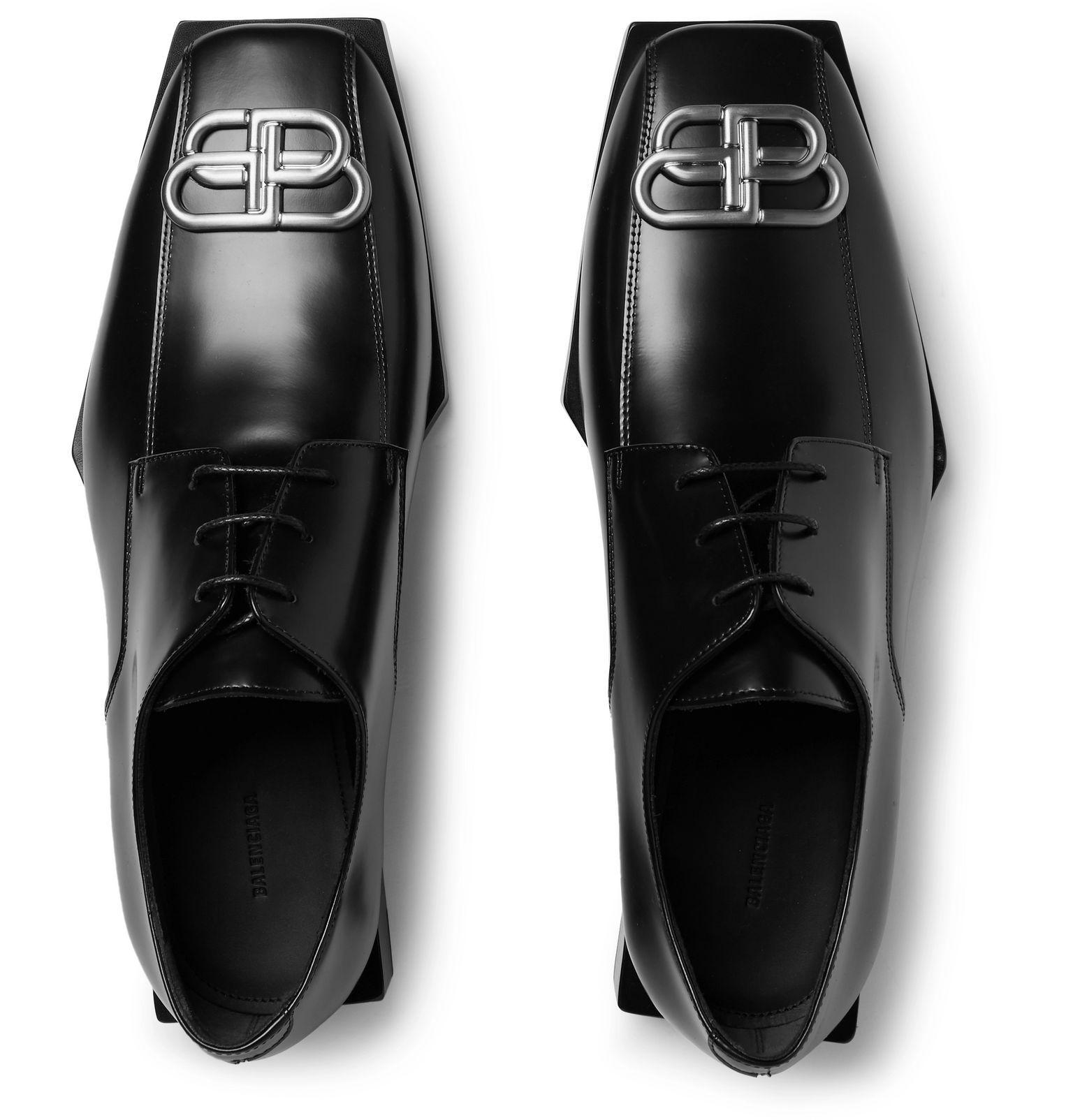Balenciaga derby shoe in glazed calf leather. Features squared toe and block heel (approx. 1