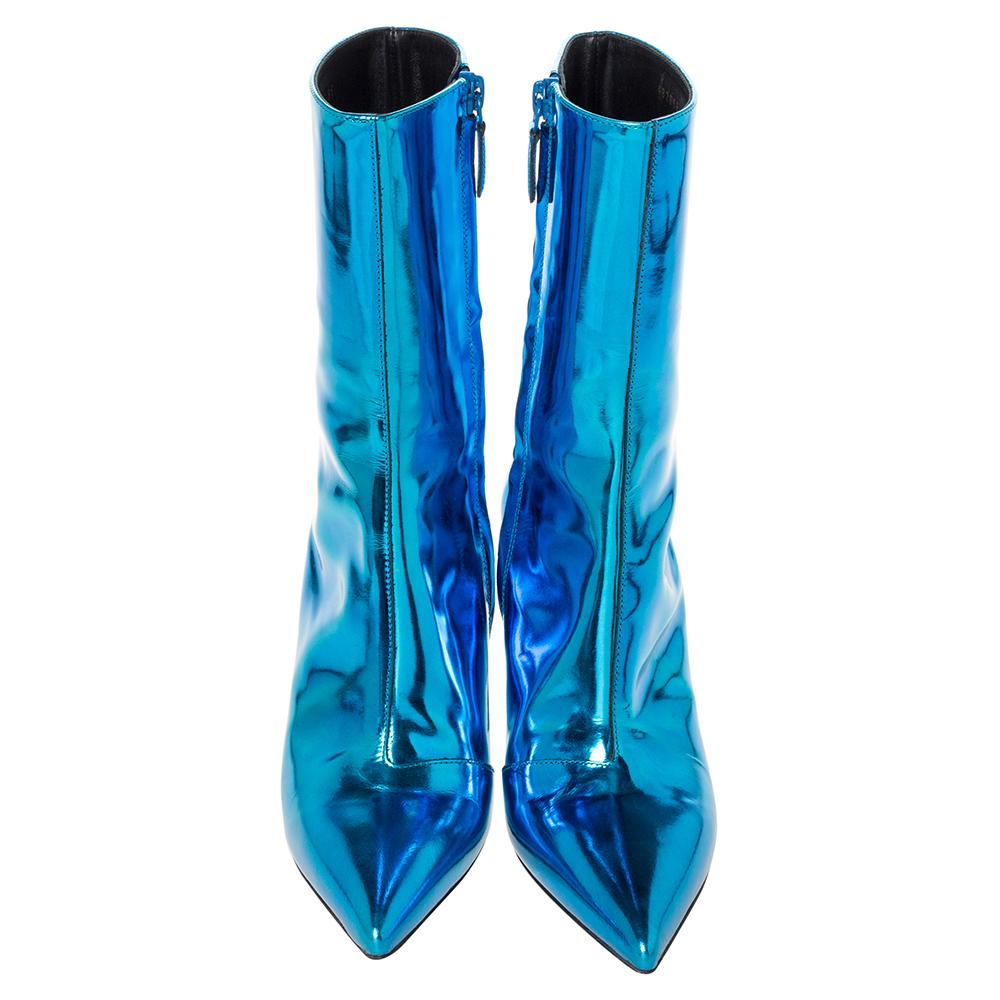 This bold pair from the house of Balenciaga is not for the simpletons. Ditch your basic pair and switch to the Slash Heel boots. These excellent shoes have been designed from metallic blue leather and feature pointed toes, side zip fastening,