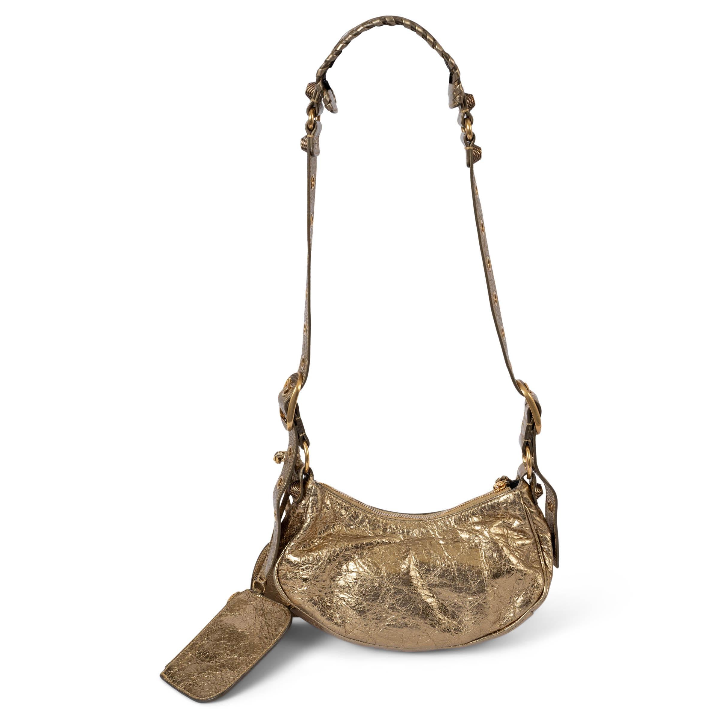 BALENCIAGA metallic gold Arena distressed leather LE CAGOLE XS Shoulder Bag In Excellent Condition For Sale In Zürich, CH