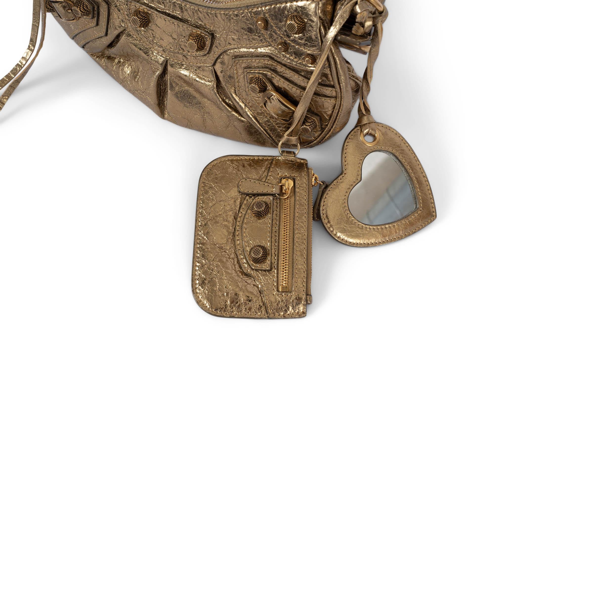 BALENCIAGA metallic gold Arena distressed leather LE CAGOLE XS Shoulder Bag For Sale 1