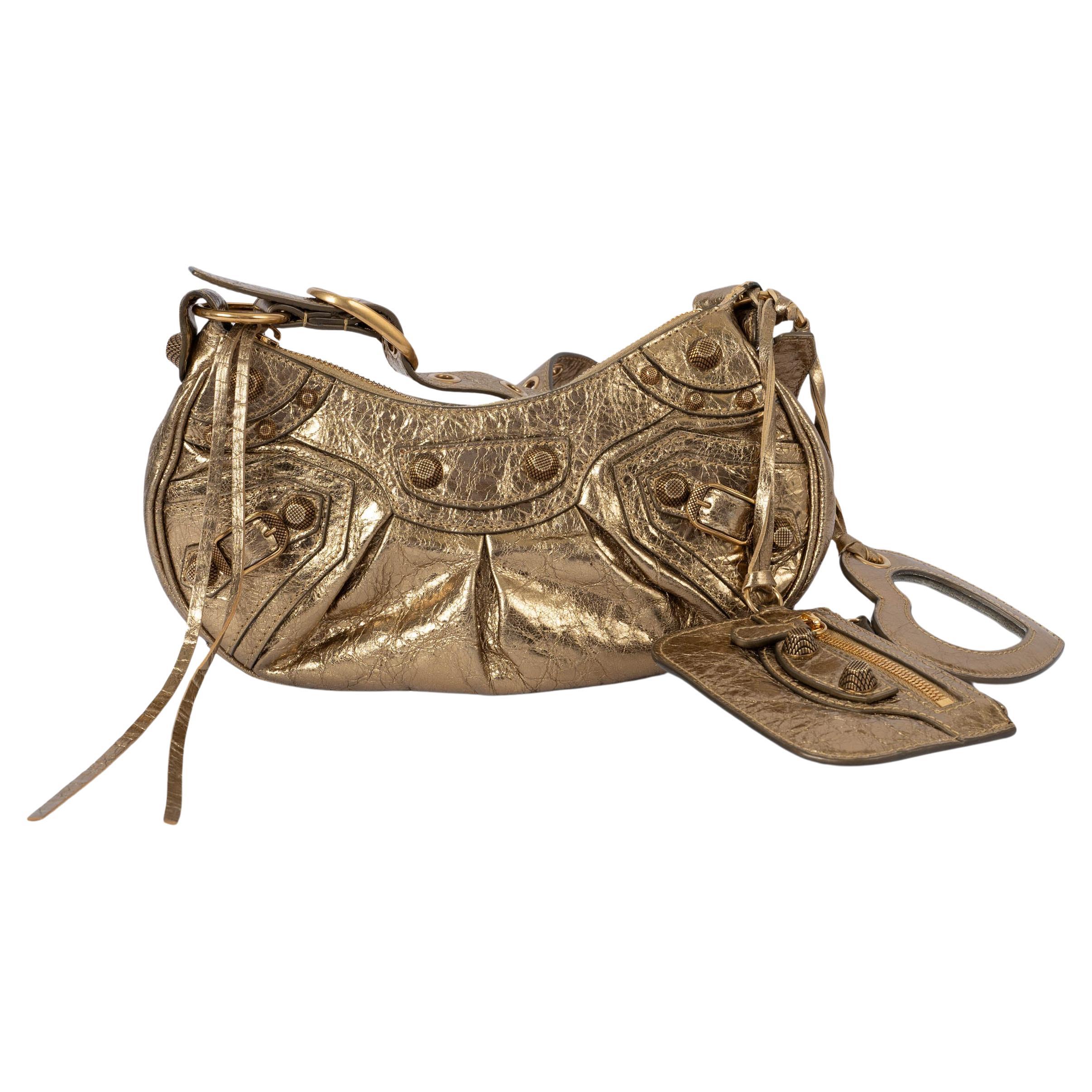 BALENCIAGA metallic gold Arena distressed leather LE CAGOLE XS Shoulder Bag For Sale