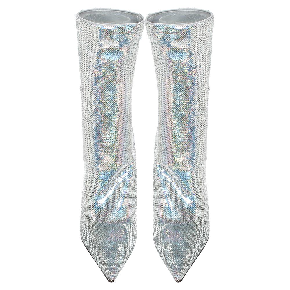 Bold and glamorous, these boots from Balenciaga will add oodles of style to your wardrobe. They come crafted from sequins in a pointed-toe silhouette and are equipped with comfortable leather-lined insoles. They are elevated on 11 cm heels. Grab