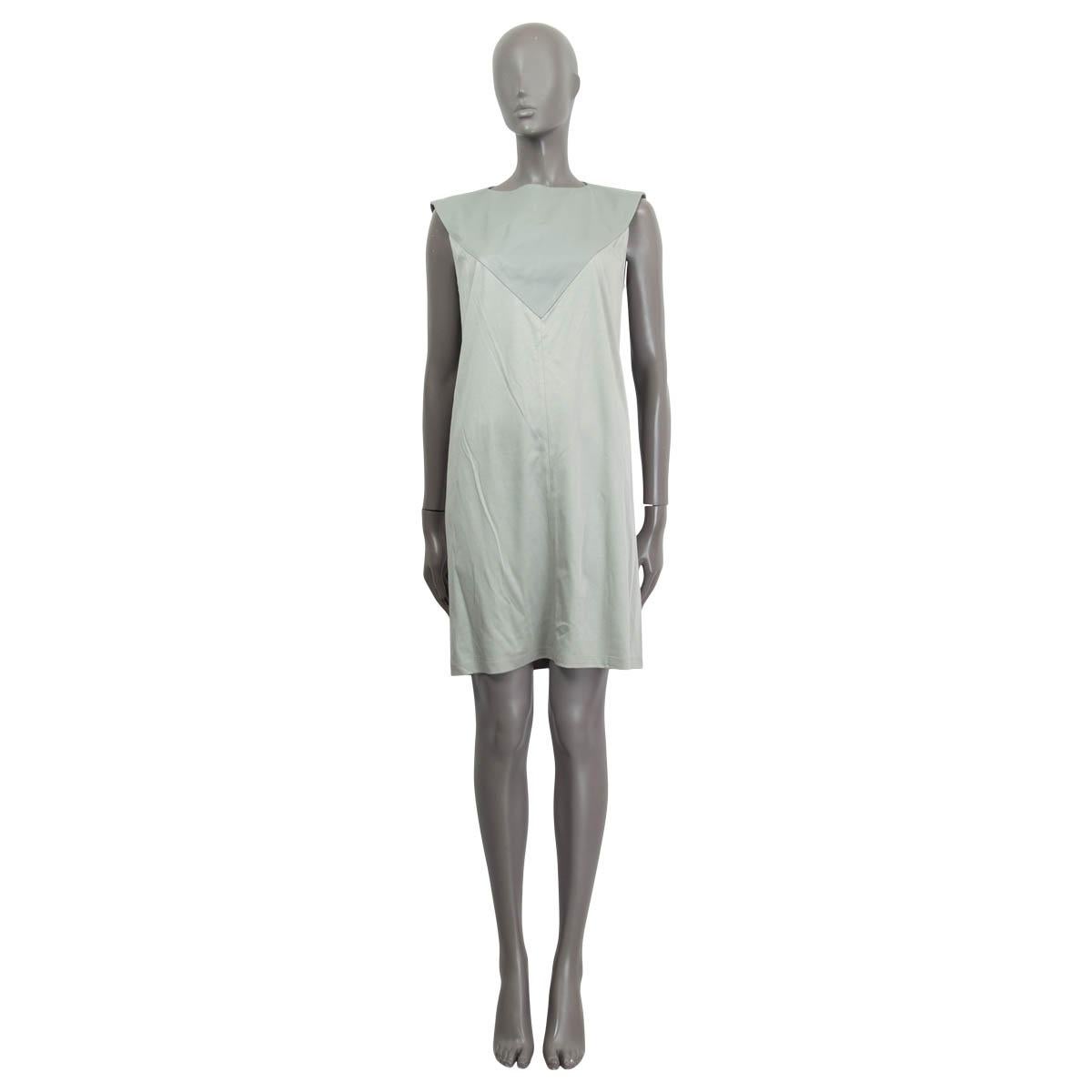 100% authentic Balenciaga sleeveless dress in mint cotton (80%) and lamb leather (20%). Opens with a concealed zipper and a hook on the back. Unlined. Has been worn once and is in virtually new condition. 

Measurements
Tag Size	40
Size	M
Bust	94cm