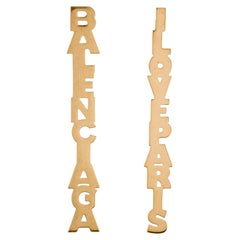 Balenciaga, boucles d'oreilles en goutte I Love Paris avec logo en or assorti