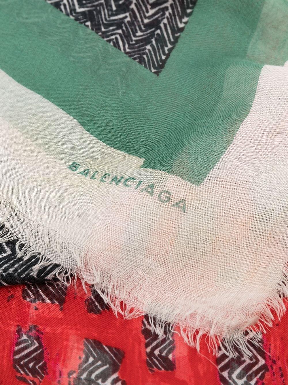 Mix print scarf from Balenciaga, finished with a frayed edge in a semi-sheer construction. 	

Colour: Red/ Green/ White/ Black	Material: Viscose	

Condition:  Very good vintage condition 8/10. No signs of wear.	

Size: Length 140cm Width 65cm