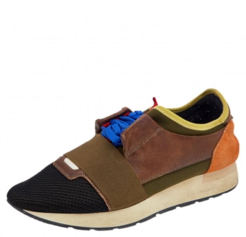 Les baskets Race Runner de Balenciaga ont été confectionnées à partir de matériaux de qualité et présentent une silhouette chic. Ils sont dotés d'orteils recouverts, de brides sur l'empeigne et de fermetures à nouer. Elles sont dotées d'une semelle