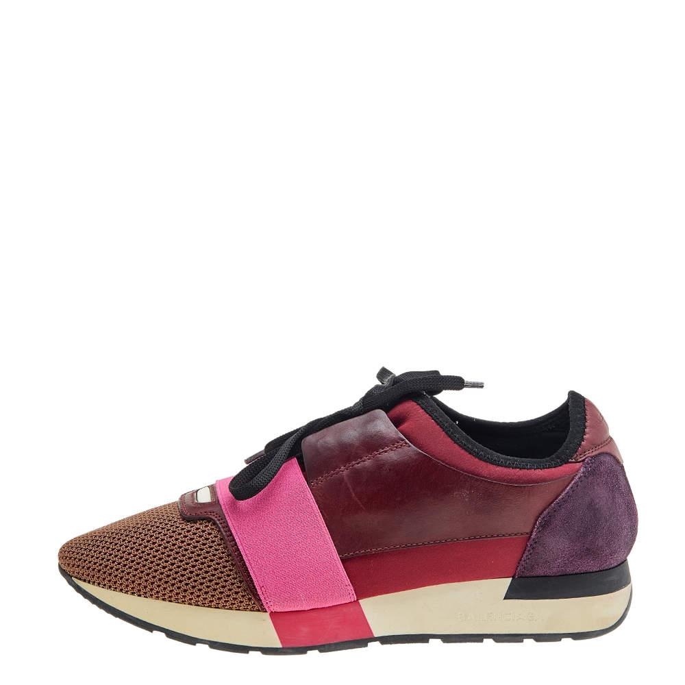 Let your latest addition be this pair of Race Runners sneakers from Balenciaga. Its exterior is crafted using leather, suede and mesh with covered toes, strap detailing on the vamps, and lace-up fastenings. This pair is completed with a