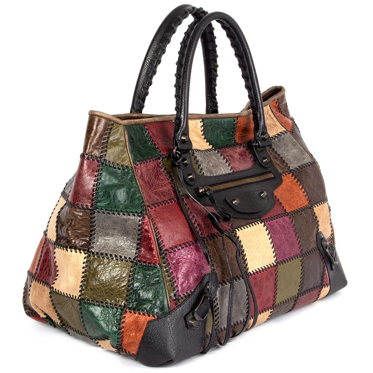 100% authentic Balenciaga 'Arena' patchwork tote bag in sand, brown, olive green, eggplant, forest green, grey, cognac and black grained calfskin featuring gunmetal hardware. Opens with a magnetic button on top and is lined in black canvas with one