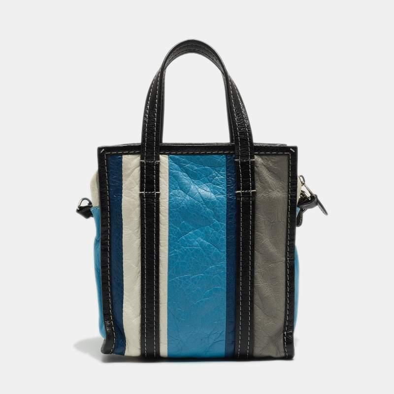 This XS Bazar Stripe tote bag for women has been designed to assist you on any day. Convenient to carry and fashionably designed, the tote is cut with skill and sewn into a great shape. It is well-equipped to be a reliable accessory.

Includes: