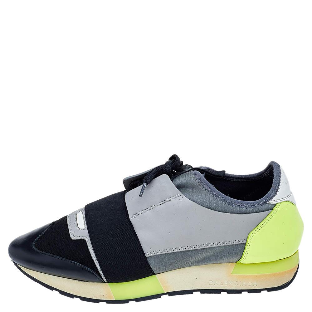 Let your latest shoe addition be this pair of Race Runners sneakers from Balenciaga. These multicolor sneakers have been crafted from mesh and leather and feature a chic silhouette. They flaunt covered toes, strap detailing on the vamps and tie-up