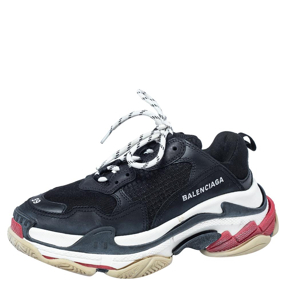 The Triple S by Balenciaga is one of the most famous sneaker designs in the world. These are crafted from a mix of materials into a chunky size, achieved by the high complex soles. They feature the shoe size on the tip of the toes, the label on the