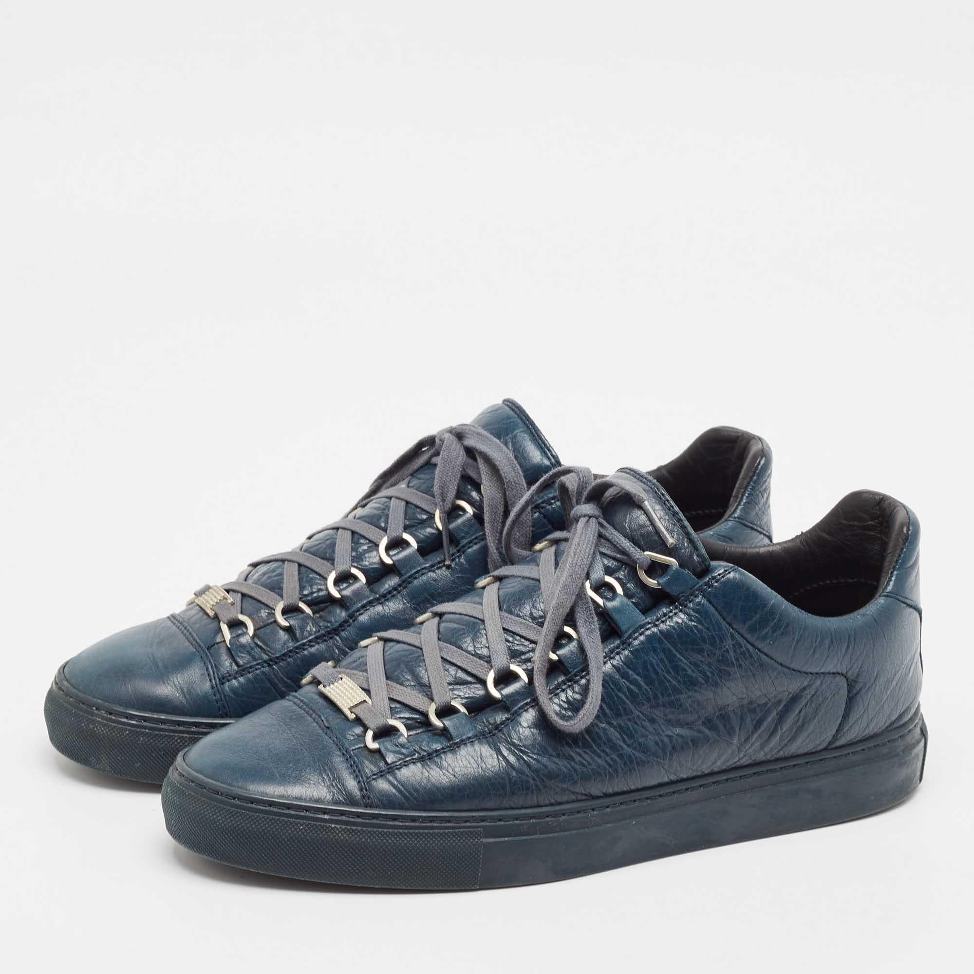 Step into effortless luxury with these Balenciaga sneakers. These luxe kicks offer a harmonious blend of style and comfort perfect for those who demand sophistication in every step.
