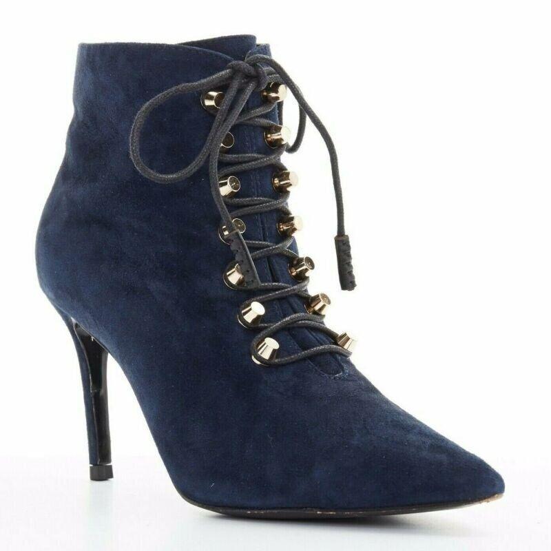 BALENCIAGA navy blue suede gold-tone stud lace up point toe bootie EU37 US7
Reference: TGAS/A02764
Brand: Balenciaga
Designer: Demna
Material: Suede
Color: Blue
Pattern: Solid
Closure: Zip
Extra Details: Navy suede leather upper. Coppertone