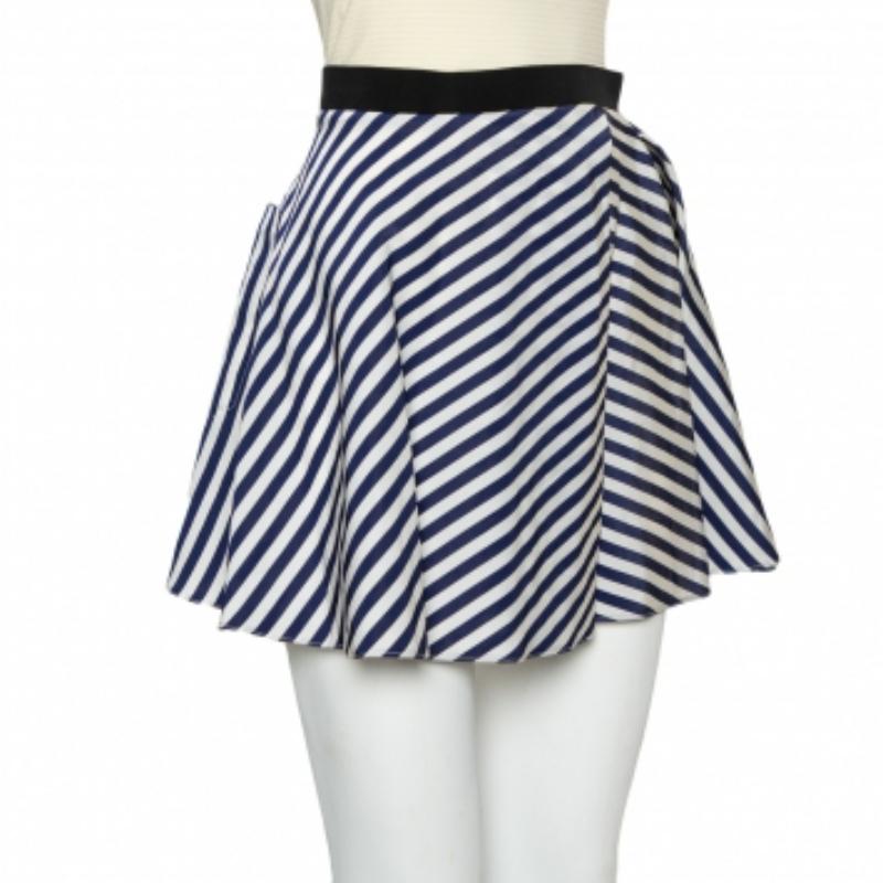 Lounge around in comfort and style wearing these Balenciaga shorts! The navy blue and white shorts are made of a blend of fabrics and detailed with a striped pattern and subtle pleats. They come equipped with a pocket and can be paired with a simple