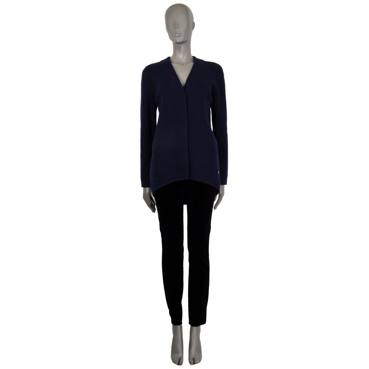 100% authentic Balenciaga cardigan in midnight blue lamb wool (100%) with a v-neck. Closes with concealed snap buttons. Unlined. Has been worn and is in excellent condition. 

Measurements
Tag Size	36
Size	XS
Shoulder Width	45cm (17.6in)
Bust	96cm