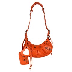 Balenciaga Neon Orange Arena Leather Le Cagole XS Shoulder Bag