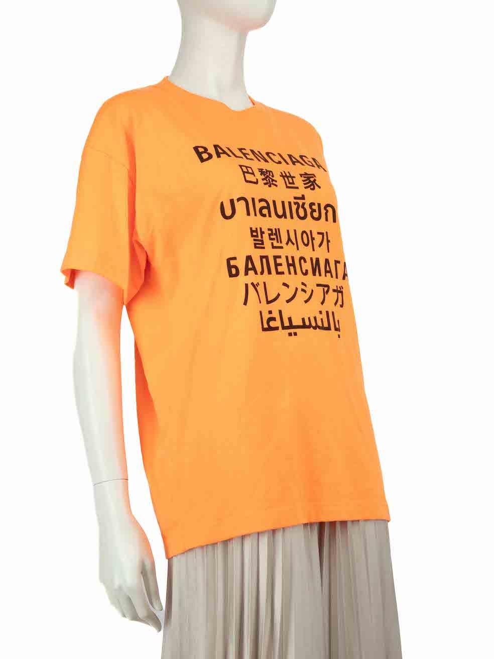 CONDITION is Very good. Hardly any visible wear to top is evident on this used Balenciaga designer resale item.
 
 Details
 Neon orange
 Polyester
 T-shirt
 Round neck
 Multi language logo
 
 
 Made in Portugal
 
 Composition
 65% Polyester, 35%
