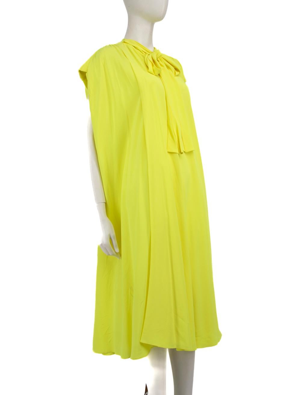 CONDITION is Very good. Minimal wear to dress is evident. Minimal wear to the hem, neck tie straps, both shoulders, neckline, front and back with discolouration on this used Balenciaga designer resale item.
 
 Details
 Neon yellow
 Silk
 Dress
