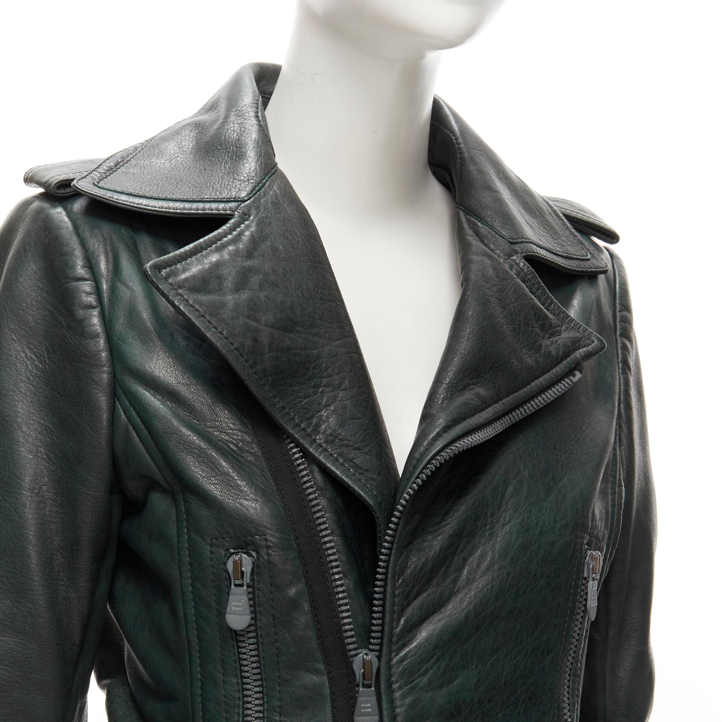 BALENCIAGA Nicholas Ghesquiere 2010 dark green tumbled leather biker jacket FR42 L
Reference: JYLM/A00030
Brand: Balenciaga
Designer: Nicolas Ghesquiere
Material: Leather
Color: Green
Pattern: Solid
Closure: Zip
Lining: Green Fabric
Extra Details: B