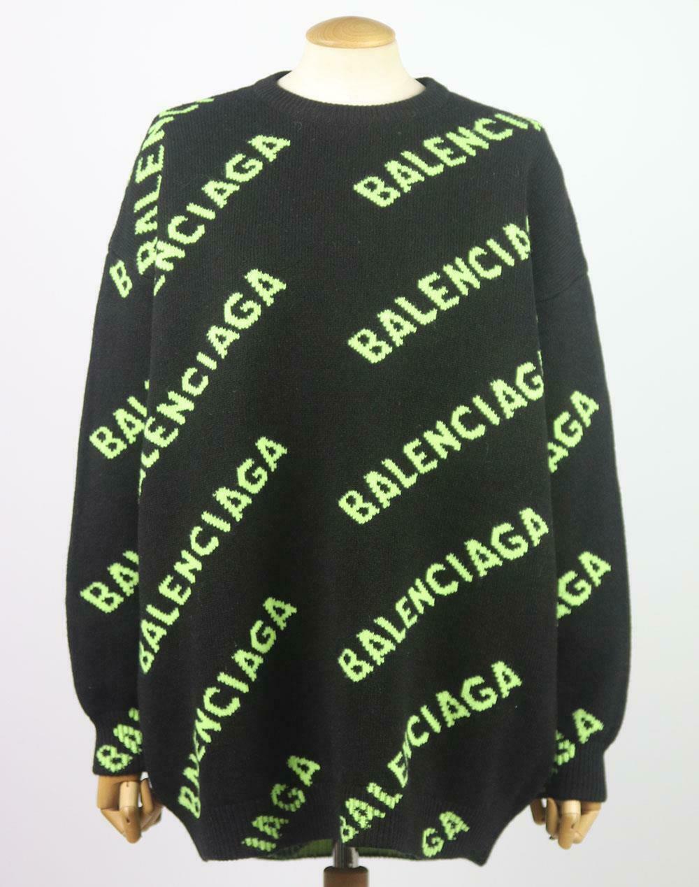 Balenciaga's oversized sweater is knitted with diagonal logo intarsia in neon-green so it pops against the black background, it's been spun in Italy from a soft wool-blend and is defined by chunky ribbed trims.
Black and neon-green wool-blend.
Slips