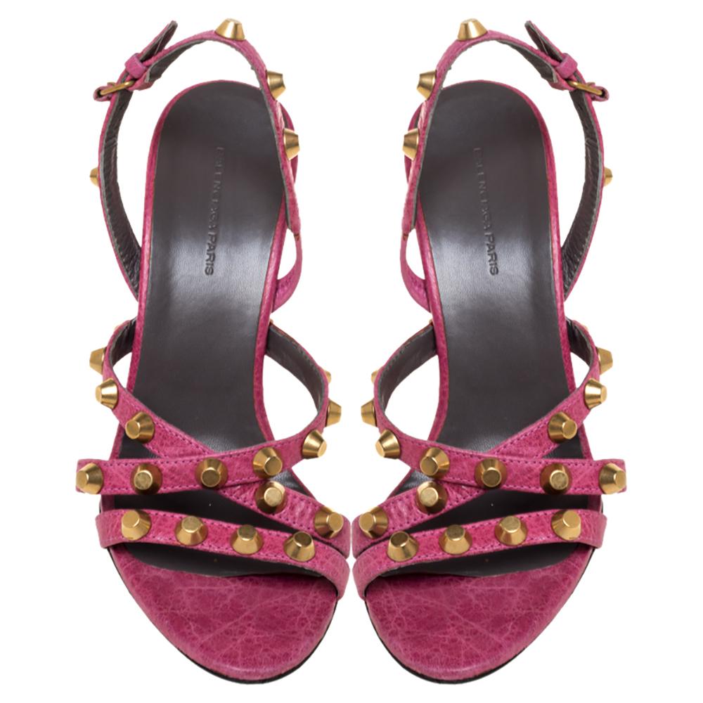 Chic and casual, these sandals are a great choice for a summer day! They are covered with pink leather and accented with gold-tone studs, a side buckle closure and leather-lined insoles. Get an instant rockstar look when you pair them with your