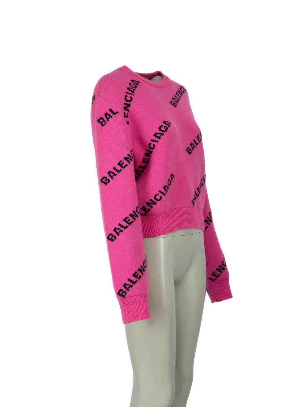 CONDITION is Very good. Minimal wear to jumper is evident. Minimal pilling to overall material and small stain to centre front is evident on this used Balenciaga designer resale item.

Details
Pink
Wool
Long sleeves jumper
Round neckline
Logo