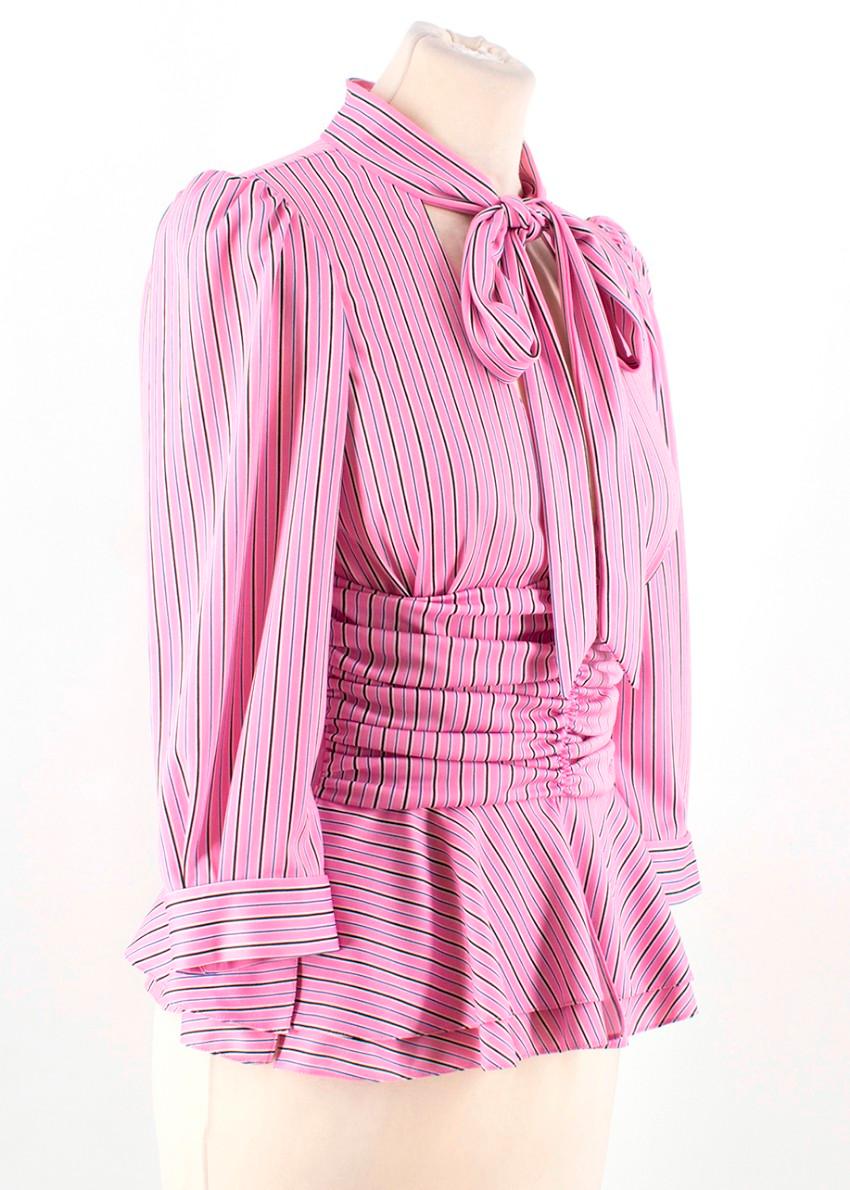 Balenciaga Pink Striped Pussybow Blouse

-Pink blouse with pussybow collar
-Pin stripes
-Buttons on cuffs
-Ruching details under the bust
-Front slits
-Side zip with hook and eye closure

Please note, these items are pre-owned and may show signs of
