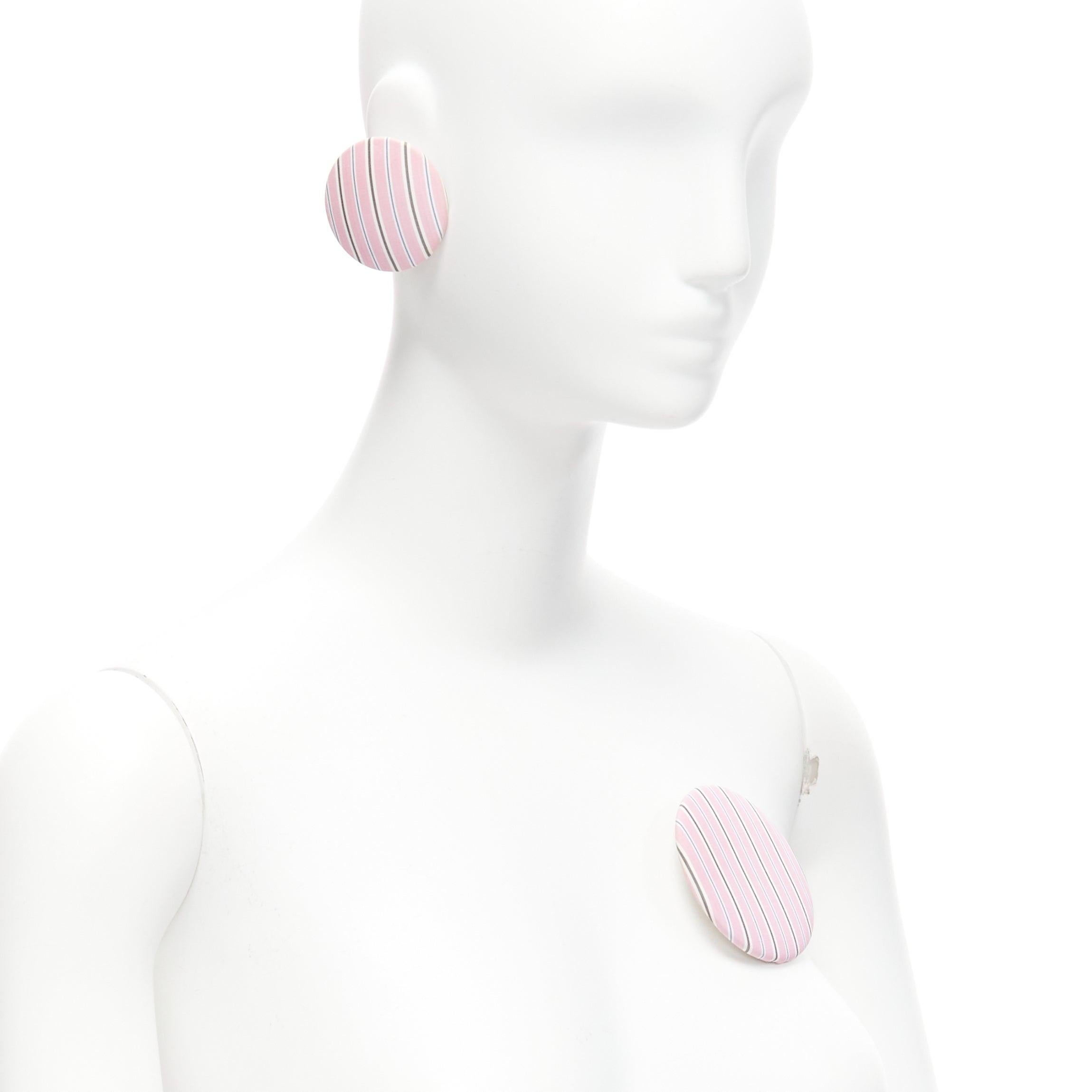 BALENCIAGA pink stripes fabric round badges studs earrings Set 3
Reference: BSHW/A00111
Brand: Balenciaga
Designer: Demna
Material: Fabric
Color: Pink
Pattern: Striped
Closure: Pin
Lining: Silver Metal
Extra Details: All 3 can be worn as pin brooch