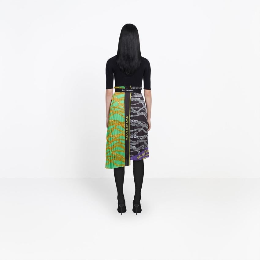 Balenciaga Rainbow Scarf Pleated Skirt

-Iconic skirt shape
-3 technical fabric printed panels
-Placed material panels
-Asymmetric shape
-Knee length
-Gathered effect at waist
-Elasticated waistband: Logo printed on waistband to wear at