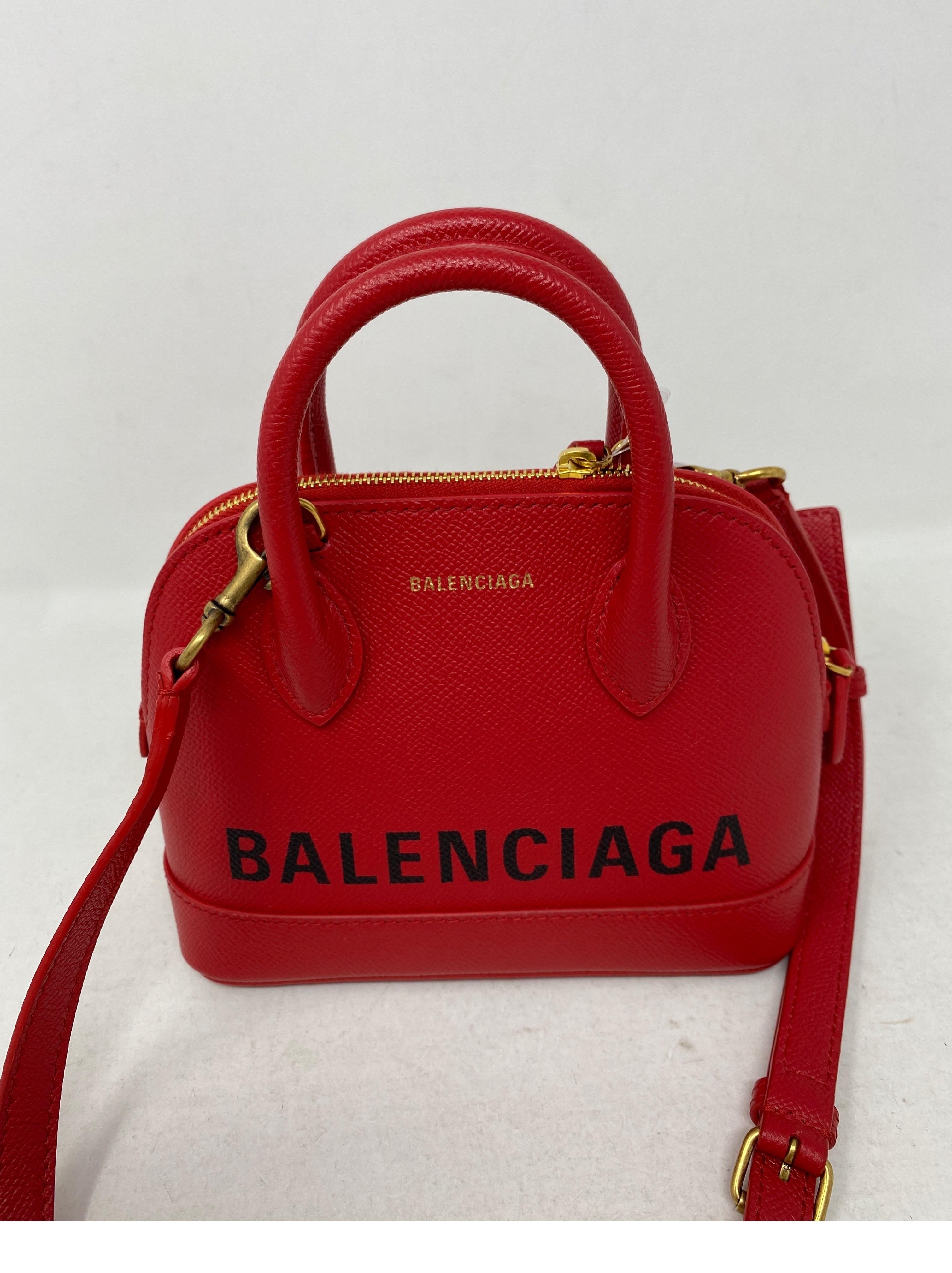 red balenciaga purse