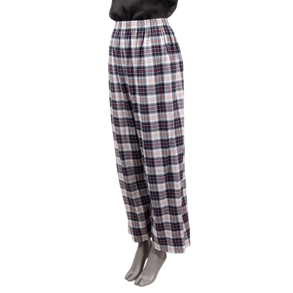 100% authentic Balenciaga plaid pants in black, white, red and blue cotton (100%). Features an elastic waistband, straight-leg and pocket in the back with logo. Have been worn and are in excellent condition.

2018 Pre-Fall

Measurements
Tag