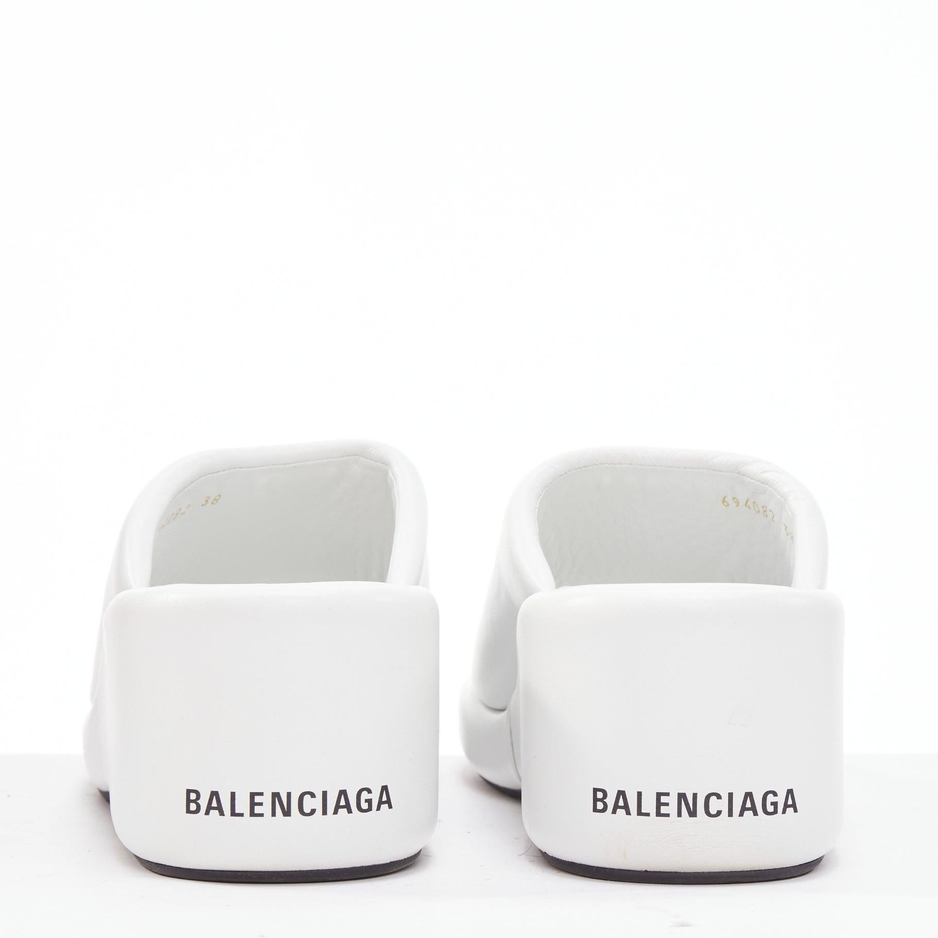 BALENCIAGA Rise white calf leather black logo padded wedged slides EU38
Reference: LNKO/A02364
Brand: Balenciaga
Designer: Demna
Model: Rise
Material: Leather
Pattern: Solid
Closure: Slip On
Lining: White Leather
Extra Details: White calf leather