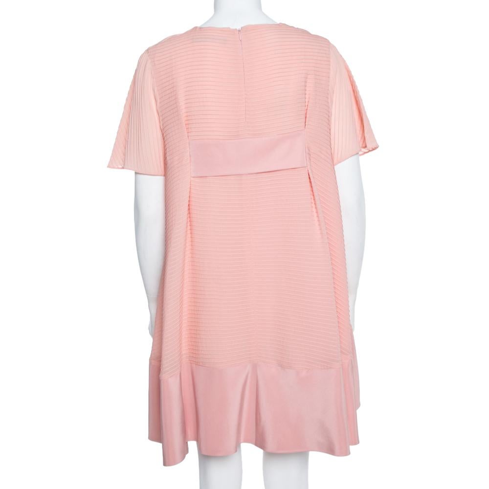On days when you don't feel dressy and want to put on something stylish yet casual, this Balenciaga dress will be an ideal choice. Made from a silk blend in a pink hue, the shift dress features pintuck detail, a backstrap, and a rear zip closure.