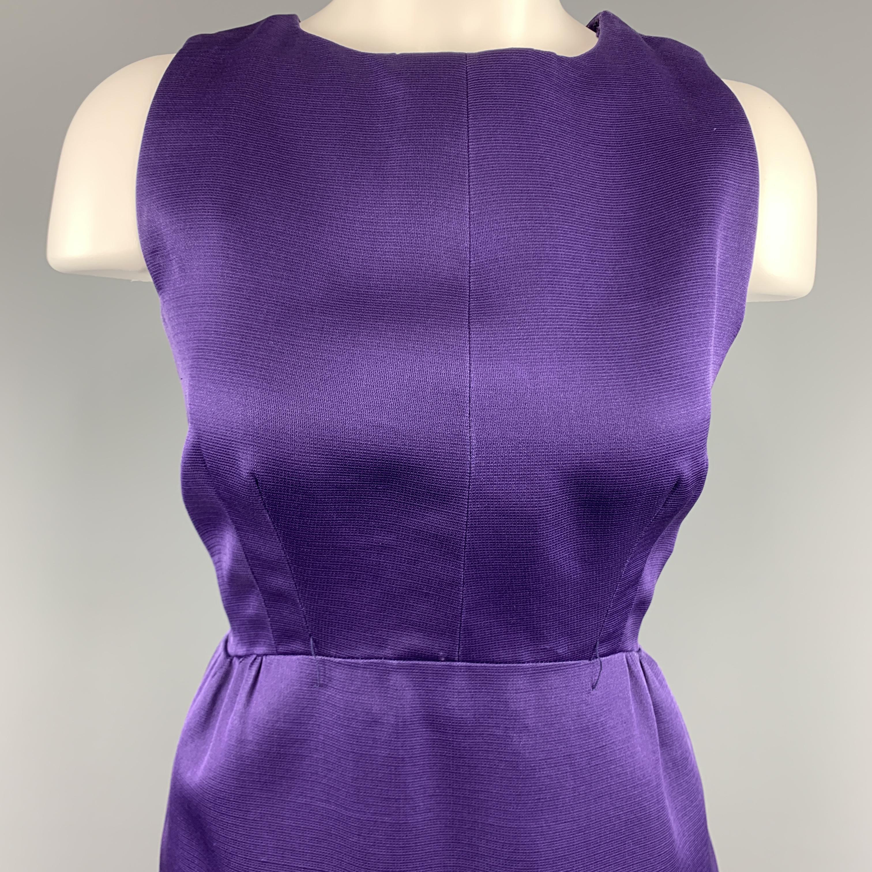 Sleeveless BALENCIAGA cocktail dress comes in structured purple silk with a round neckline, empire waist, and A line skirt with ruffle trim. Wear throughout. Made in France.

Good Pre-Owned Condition.
Marked:  FR 38

Measurements:

Shoulder: 12