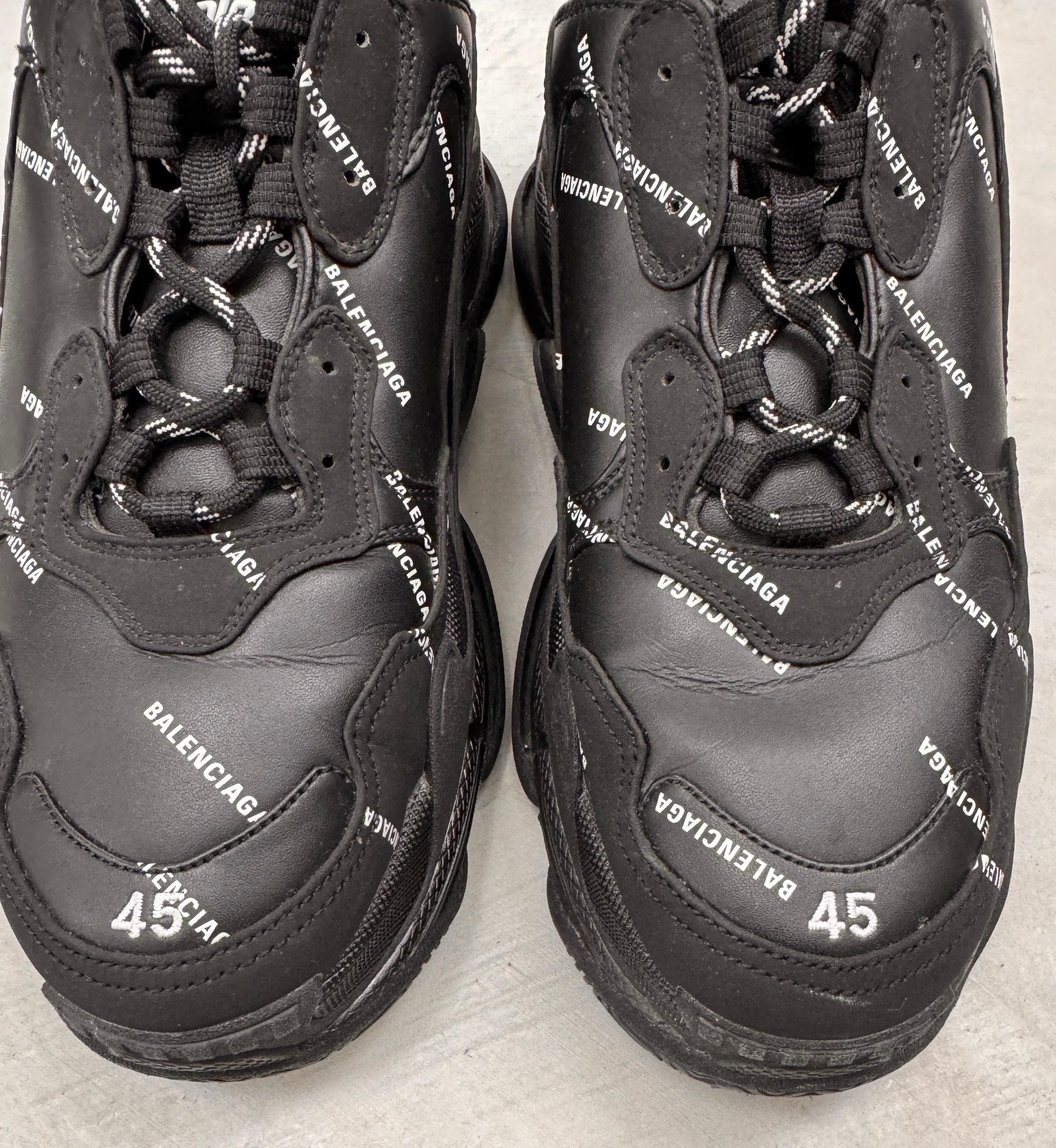 Balenciaga Triple S Allover Logo Black Sneaker shoes 

White 45 Size 12
Shoe Shaft Style: Low Top  
UK Shoe Size 11 
Style Code: 536737-W2FA1-9010   
US Shoe Size 12
EU Shoe Size 45
Color: Black
Model: Balenciaga Triple S 
Box shows wear, sneakers