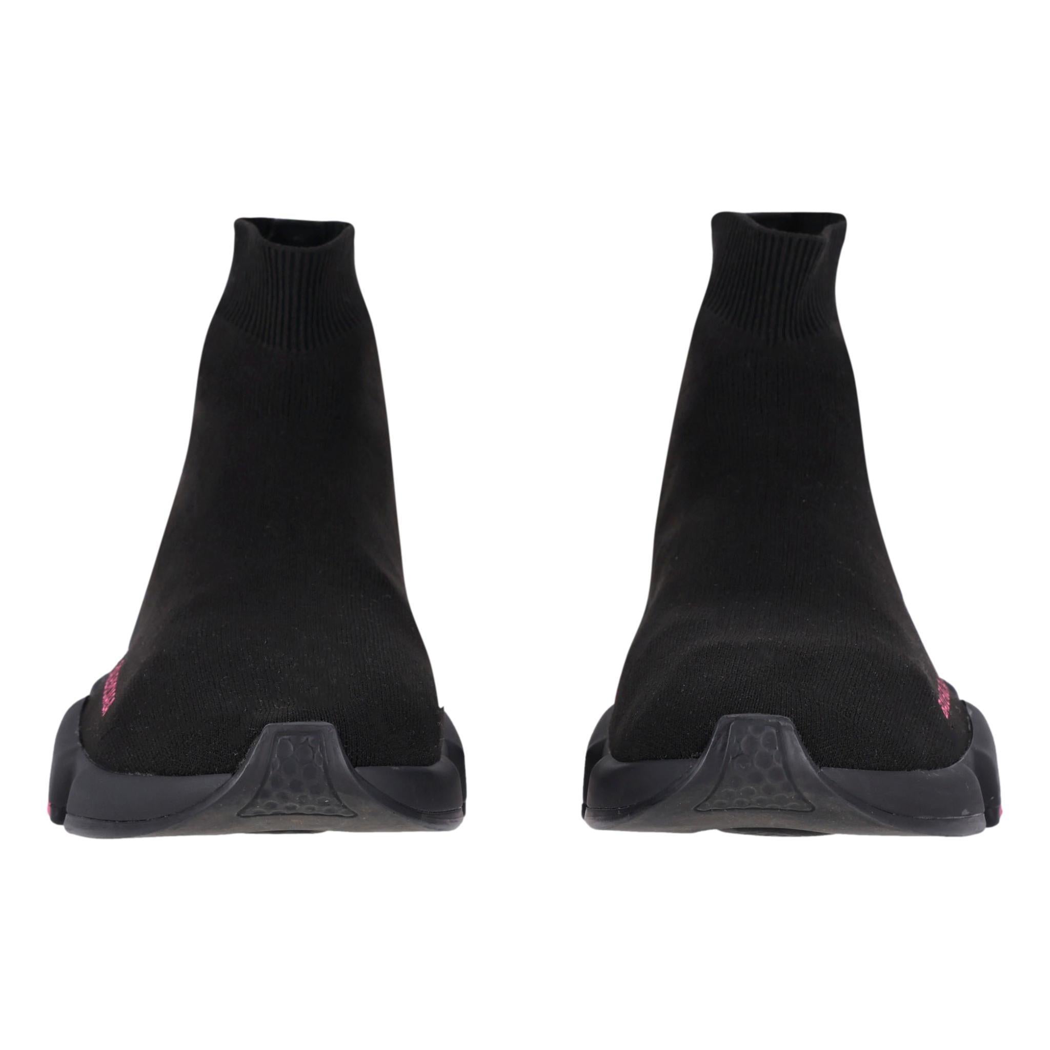 Balenciaga Speed Sock Trainers

Black neoprene knit 'Speed Clear Sole'

 Sneaker's with bright pink,clear and black rubber soles.

Featuring a white Balenciaga logo on the sides, a rib-knit heel, and a memory sole with an embossed logo at the