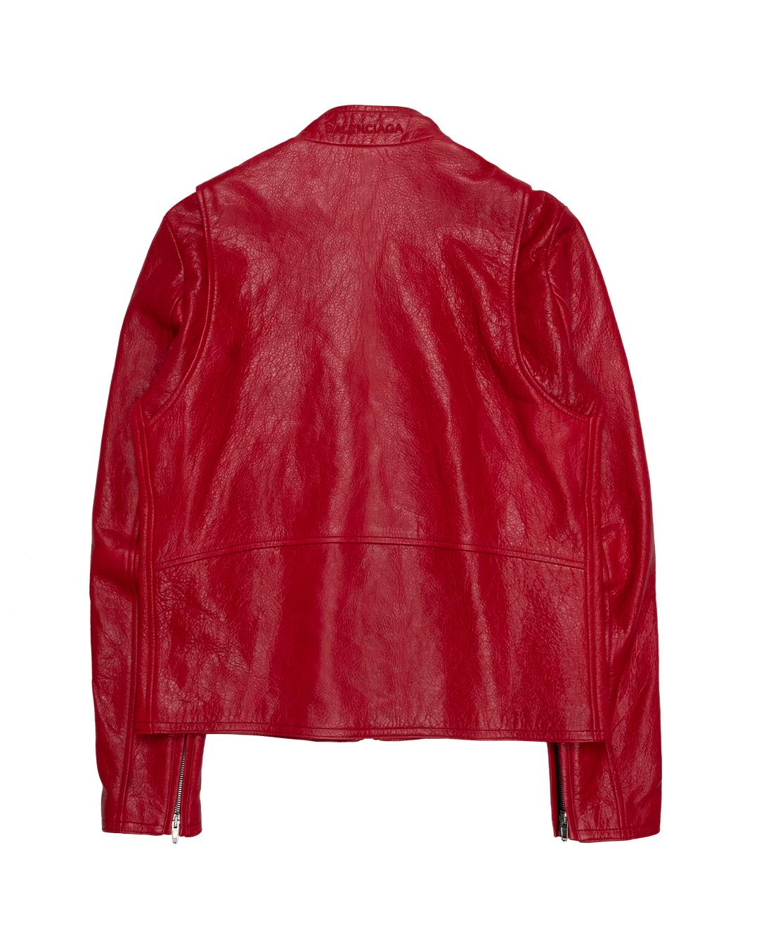 From Demna Gvasalia’s men’s debut at Balenciaga, despite its bold red color, the overall effect more subdued than usual for him. Though the Balenciaga logo appears on the back of the neck, it eschews any exaggerated silhouette or bold