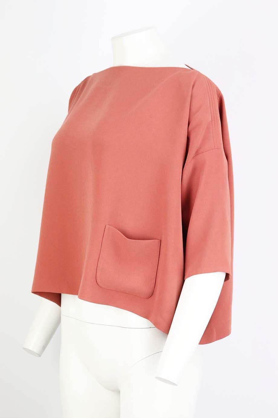 This top by Balenciaga is cut from stretch-crepe in a boxy silhouette - playing with proportion is a longstanding brand signature, it’s finished with a pocket on the front. Dusty-peach silk. Slip on. 60% Triacetate, 40% polyester. Size: FR 36 (UK 8,