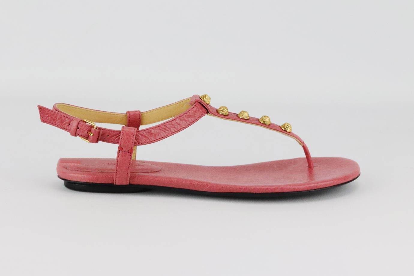 Balenciaga studded glossed leather sandals. Pink. Buckle fastening at side. Does not come with box or dustbag. Size: EU 38 (UK 5, US 8). Insole: 9.5 in. Heel: 0.5 in
