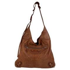 Balenciaga Tan Brogue Perforated Leather Giant Besace Hobo Bag For Sale at  1stDibs | balenciaga besace, tan balenciaga bag, balenciaga hobo bag