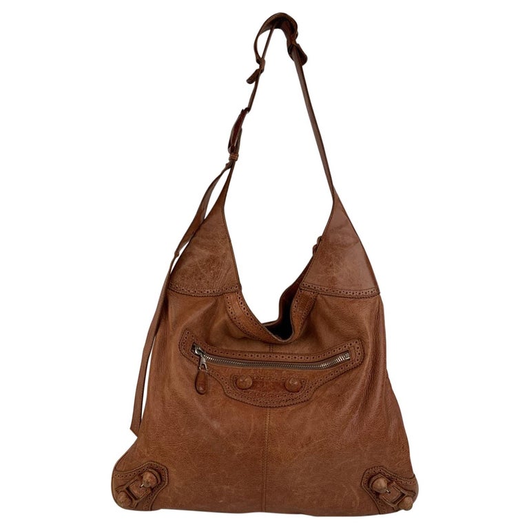 Balenciaga Tan Brogue Perforated Leather Giant Besace Hobo Bag For Sale at  1stDibs | balenciaga besace, balenciaga tan bag, balenciaga slouchy bag
