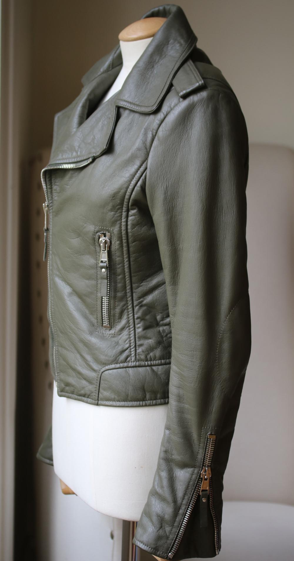 Cut for a close fit, this piece is crafted from supple textured-leather and has an asymmetric zip fastening and silver hardware. Green textured-leather. Asymmetric zip fastening through front. 100% leather (Lamb); lining: 100% rayon. 

Size: FR 40