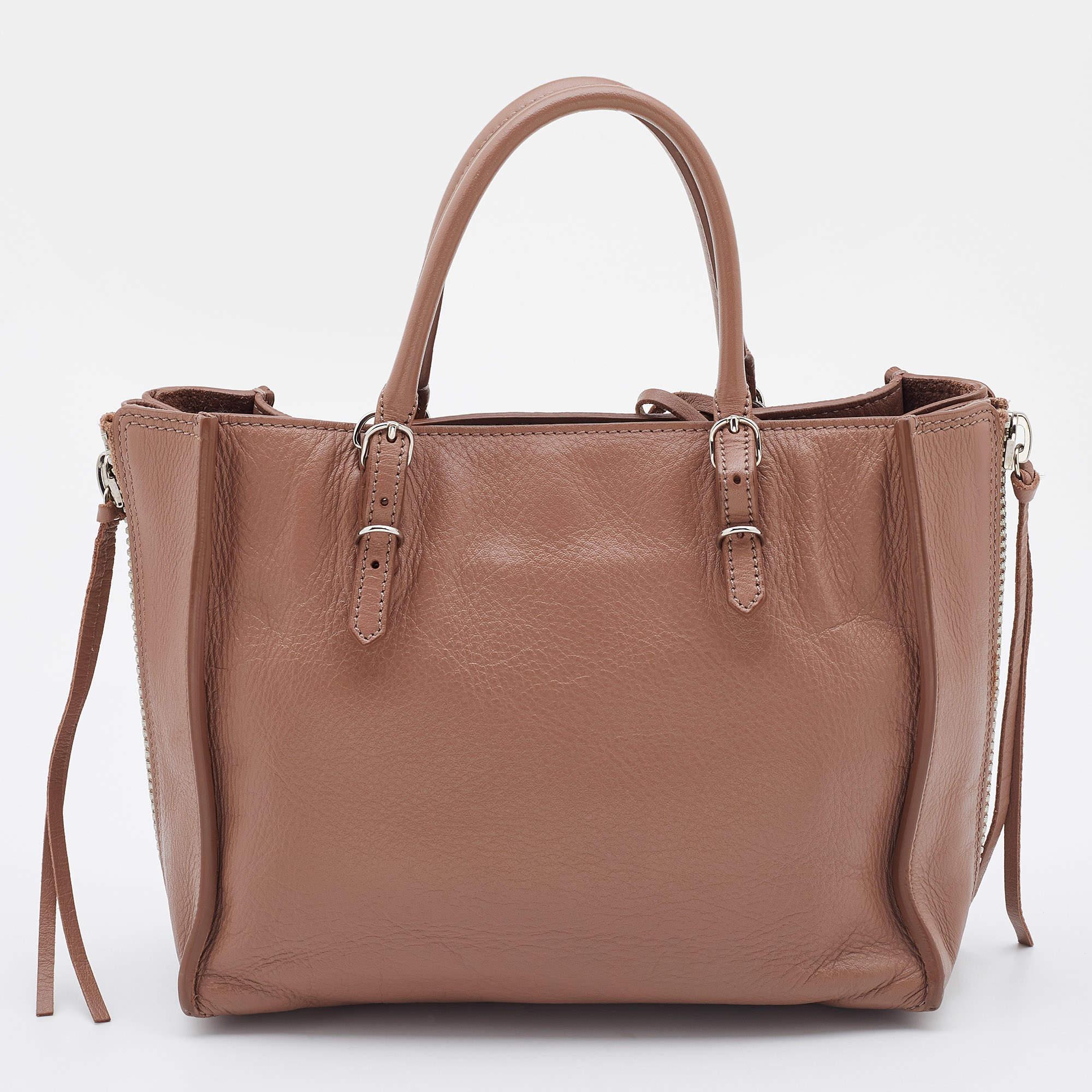This alluring Balenciaga tote bag for women has been designed to assist you on any day. Convenient to carry and fashionably designed, the tote is cut with skill and sewn into a great shape. It is well-equipped to be a reliable accessory.

Includes: