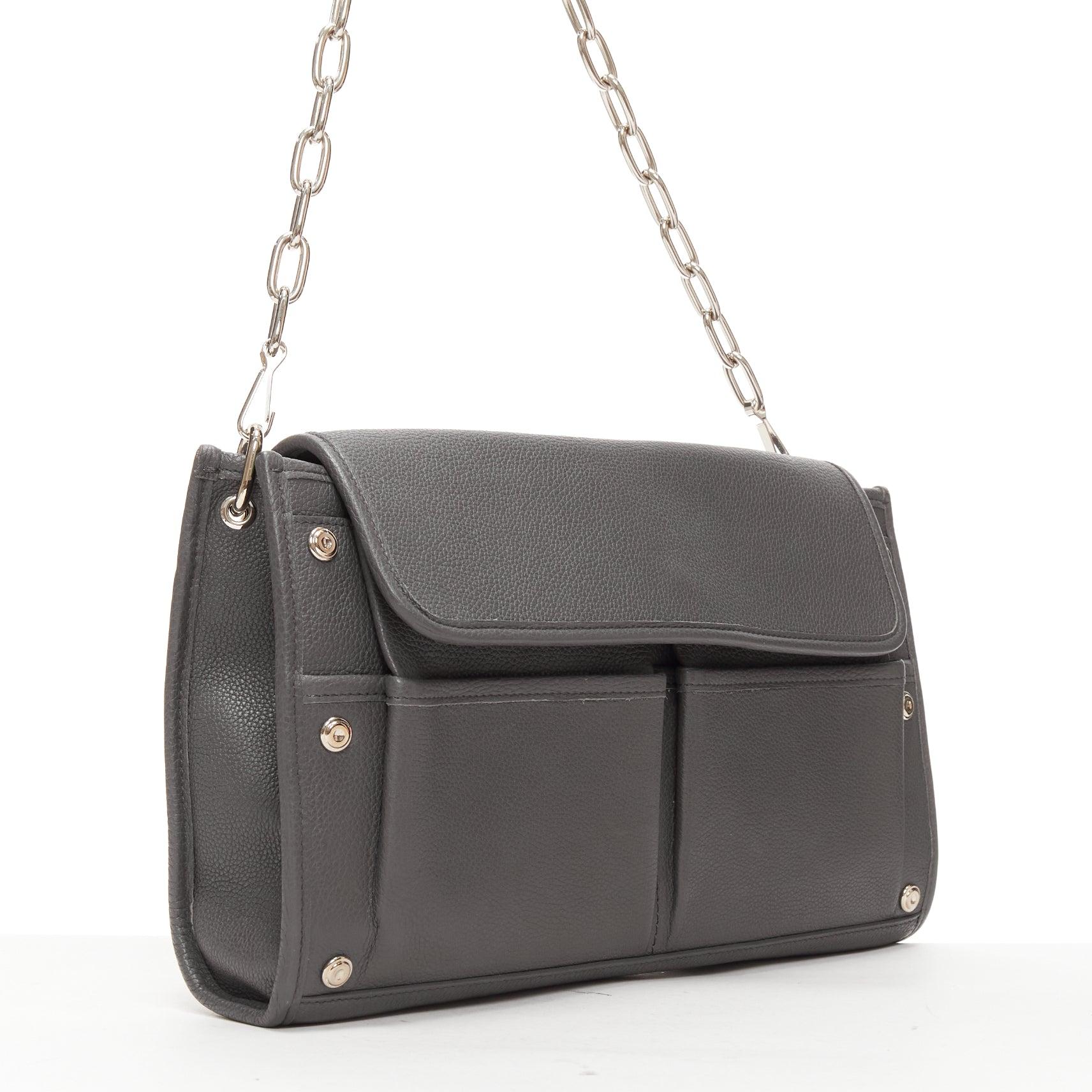 BALENCIAGA Tool grey leather double pocket flap crossbody clutch bag
Reference: NKLL/A00233
Brand: Balenciaga
Model: Tool
Material: Leather
Color: Grey, Silver
Pattern: Solid
Closure: Snap Buttons
Lining: Brown Suede
Extra Details: Pebbled calfskin