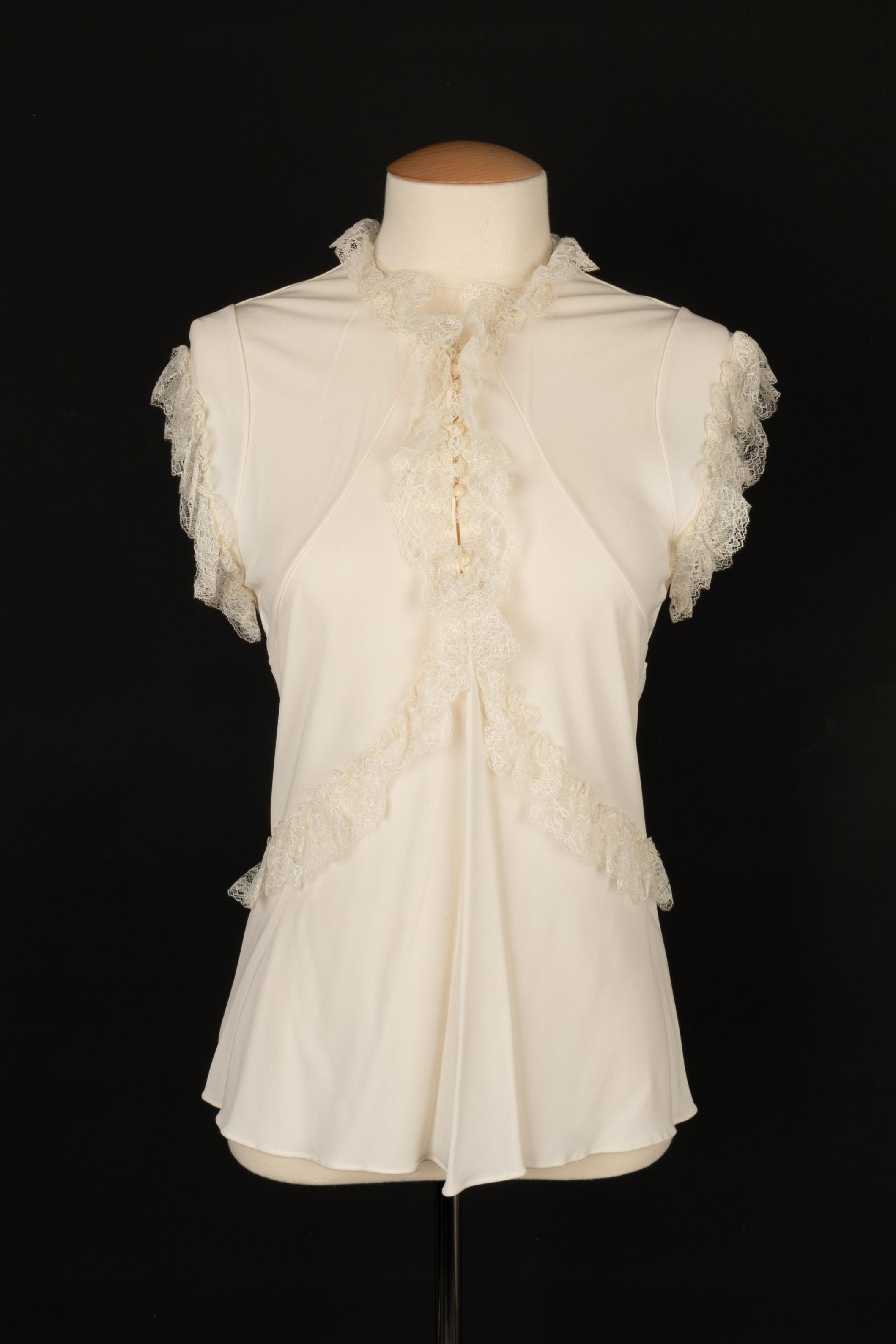 BALENCIAGA - (Made in France) Beige mesh top with lace. Size 38FR.

Condition:
Very good condition

Dimensions:
Chest: 42 cm - Length: 58 cm

SKU:FH286