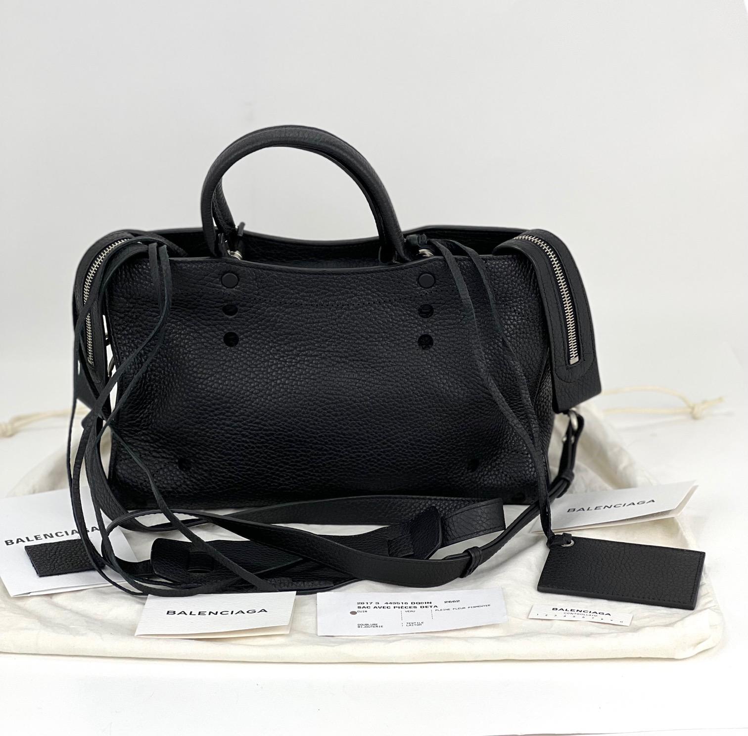 Pre-Owned  100% Authentic
BALENCIAGA Calfskin Blackout Hardware
Perforated S City Bag
RATING: A..excellent, near mint, only
slight signs of wear
MATERIAL: calfskin leather
STRAP: leather removable adjustable strap
45'' to 49'' long
DROP: 21'' to