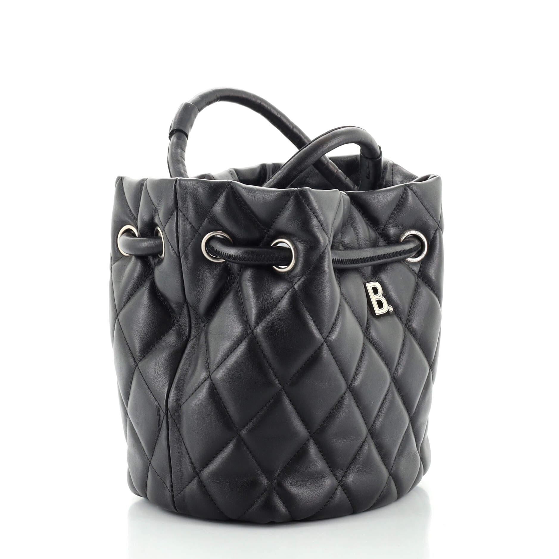 black quilted bucket bag