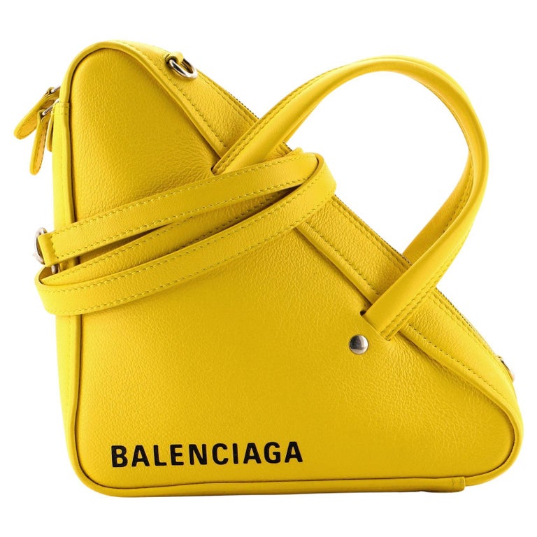 Balenciaga Triangle Duffle Bag Leather Small at 1stDibs | balenciaga  triangle bag, balenciaga yellow triangle bag