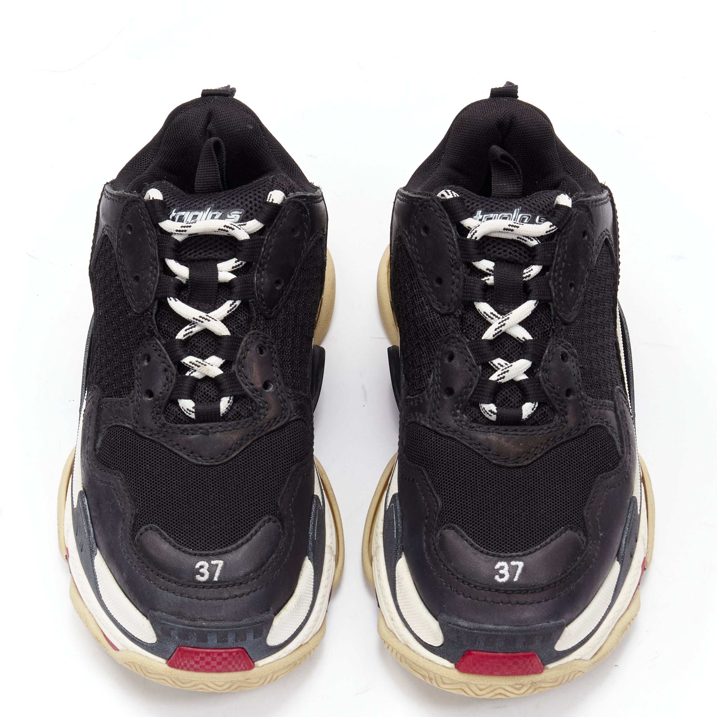 BALENCIAGA Triple S black mesh white red triple sole chunky sneaker EU37 
Reference: MELK/A00225 
Brand: Balenciaga 
Designer: Demna 
Model: Triple S 
Material: Mesh 
Color: Black 
Pattern: Solid 
Made in: China 

CONDITION: 
Condition: Good, this