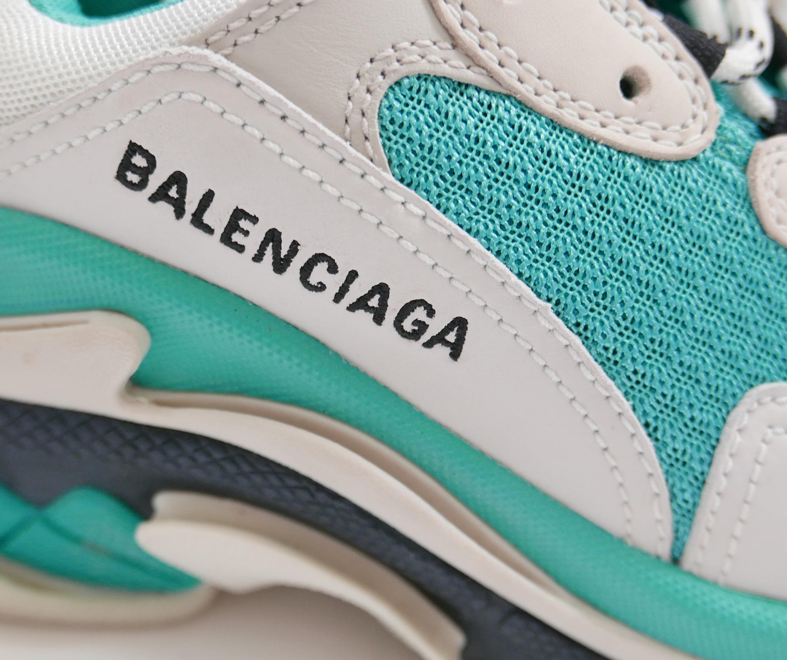 Super rare, Balenciaga Triple S sneakers in Turquoise Grey colourway. Worn once. Come with dustbag. Made from turquoise, pearl grey and white leather and mesh, they have signature super chunky design with lace-up fronts, padded ankles, rubberised